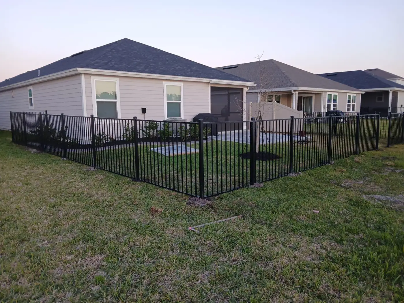 Black aluminum backyard fence