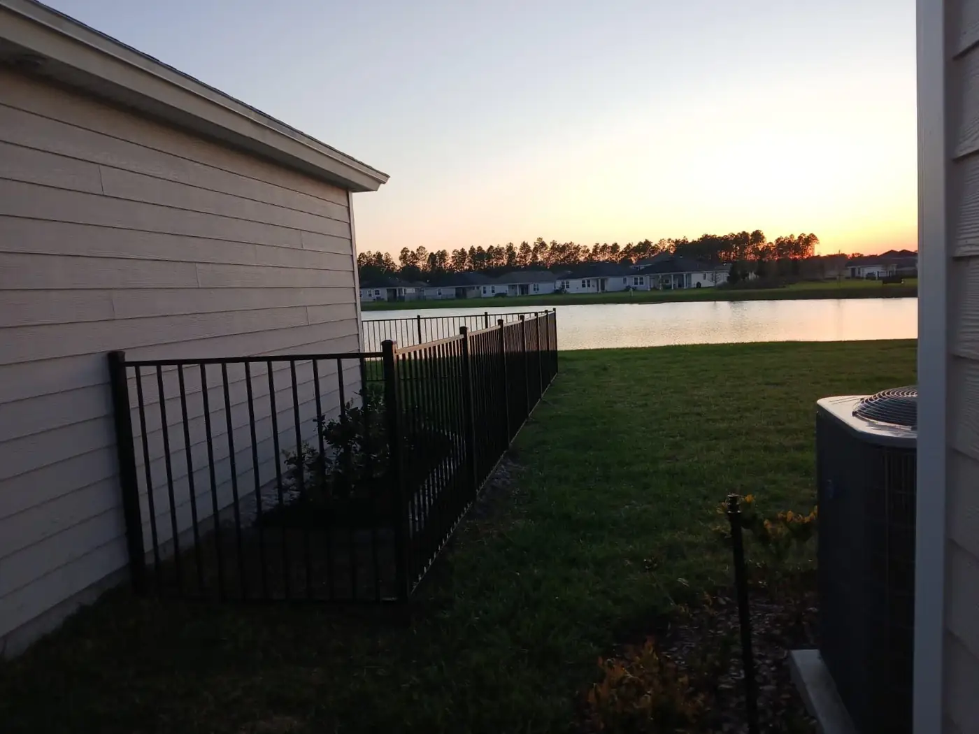 Black aluminum fence side yard