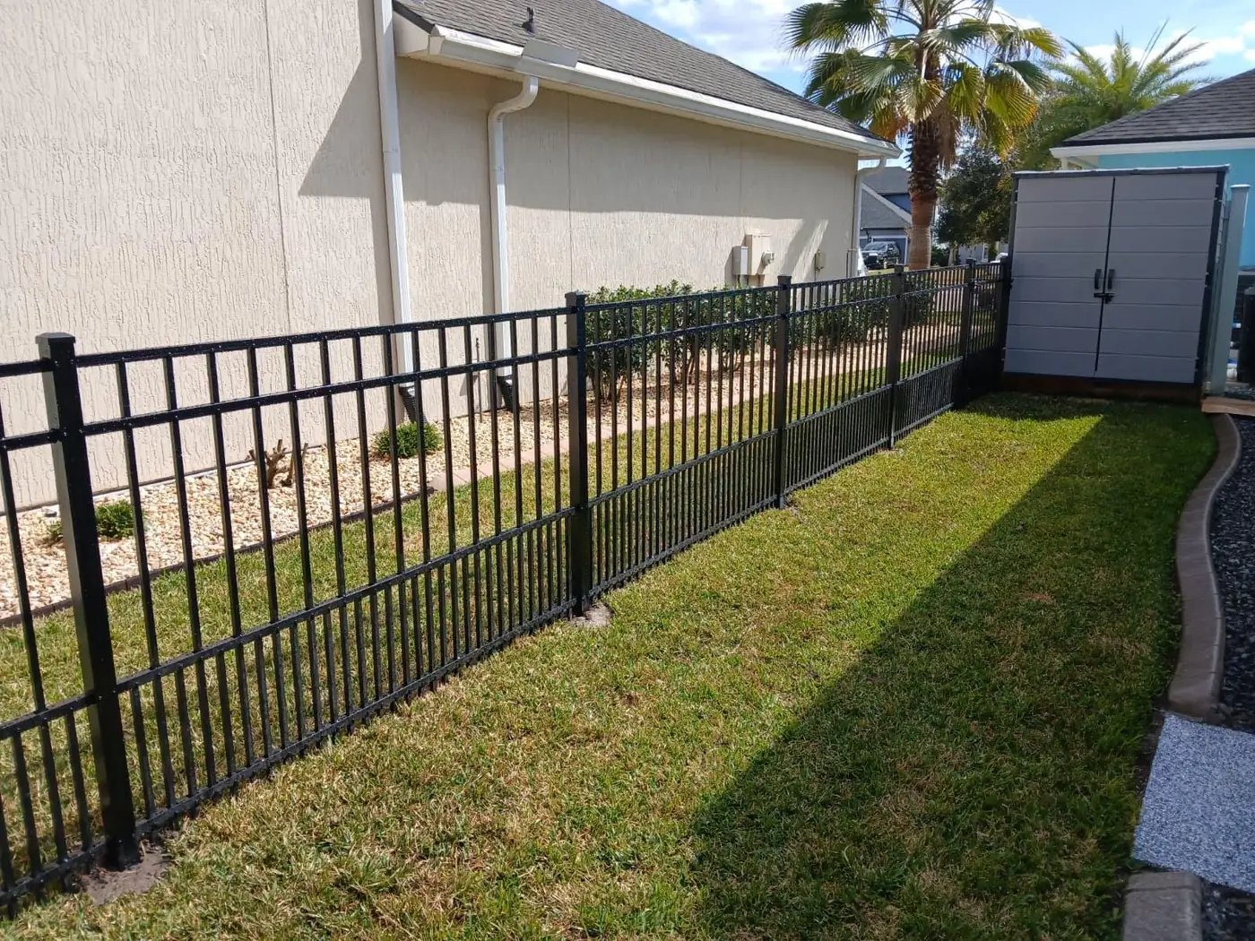 Black aluminum side yard fence