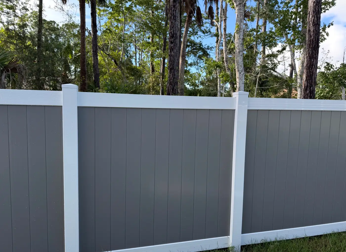 Dark grey vinyl privacy fence