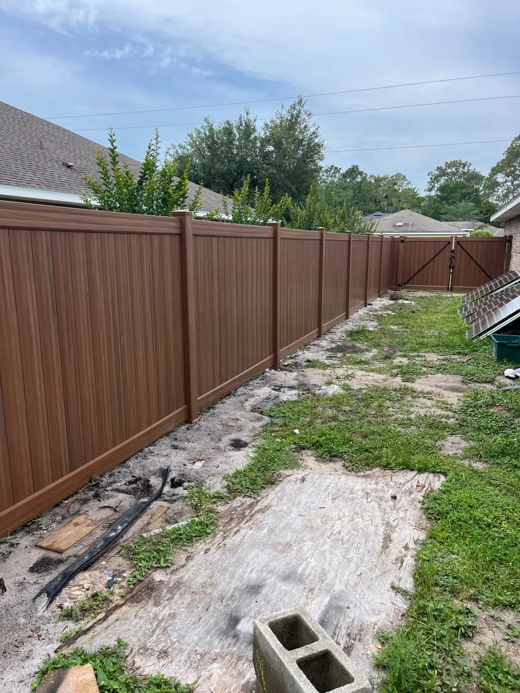 Mocha vinyl privacy fence run