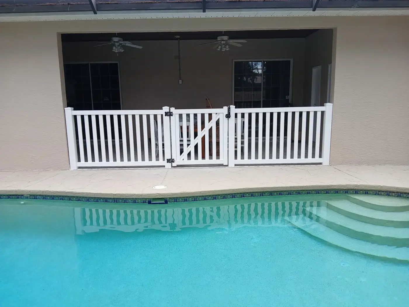 White vinyl picket fence